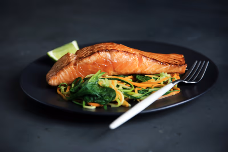Fresh salmon and fish oil supplements rich in omega-3